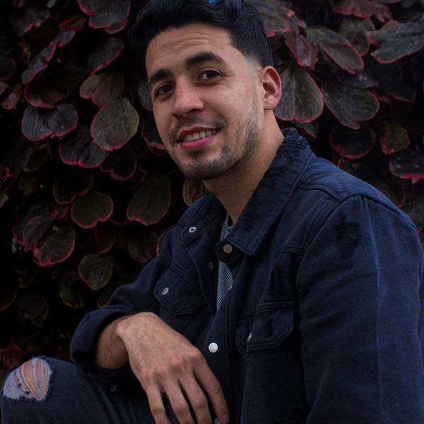 Profile of a content and smiling man looking confidently towards the future.